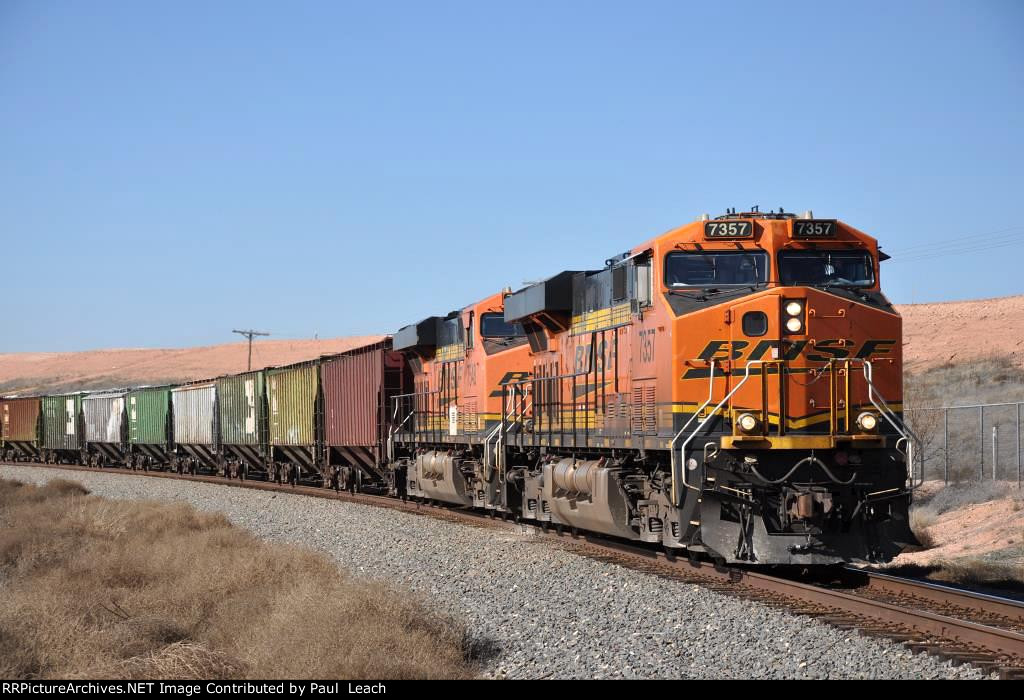 Grain train rolls east